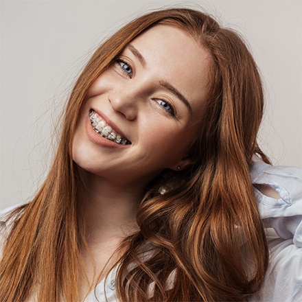 A woman with clear braces