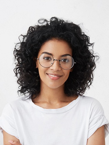 woman smiling with clear aligners in Chicago