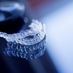 clear aligners sitting on a surface