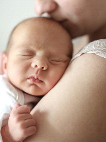 baby sleeping after a laser frenectomy