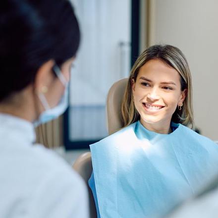Patient speaking with dental professional during consultation
