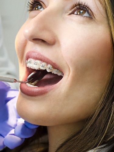 woman dental exam interdisciplinary orthodontics