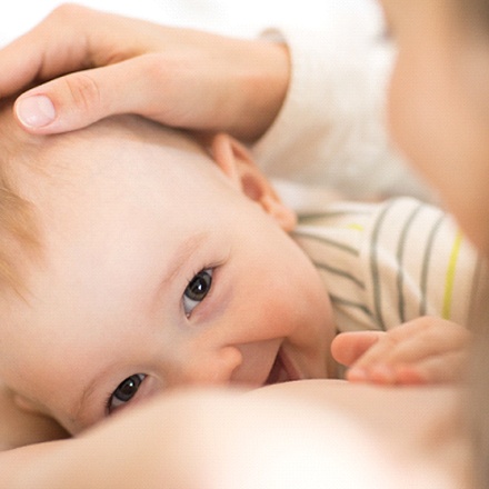 happy breastfeeding baby