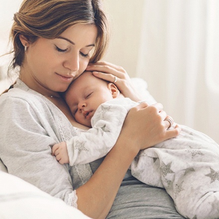 sleeping baby and mom