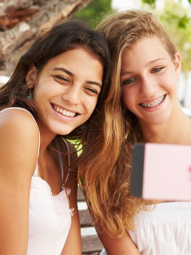 Two teen girls taking a selfie