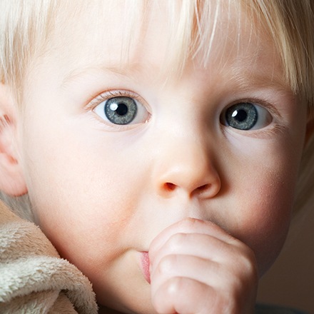 Toddler sucking his thumb