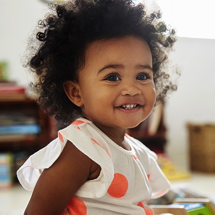 Toddler girl with healthy new smile