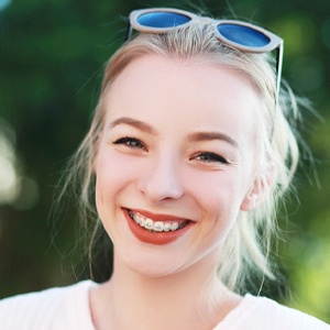 woman smiling wearing braces