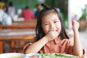 Child eating lunch. 